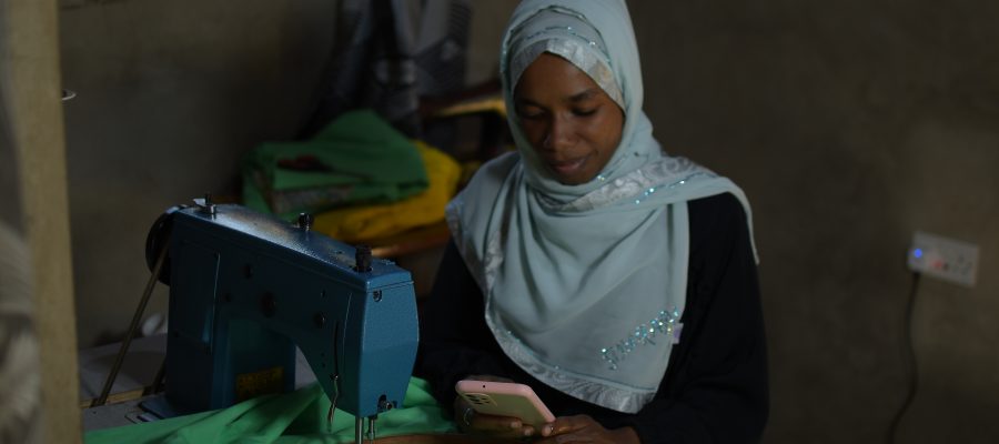 A young mother and widow using digital platforms to promote her business beyond her region. 